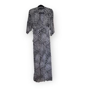 Stretch black and white dress. Size large. Flows and sexy. Used. $20.00